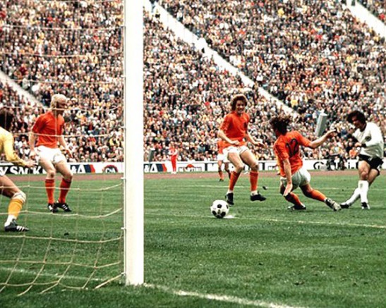 German striker Gerd Mueller scores against Holland in the 1974 World Cup